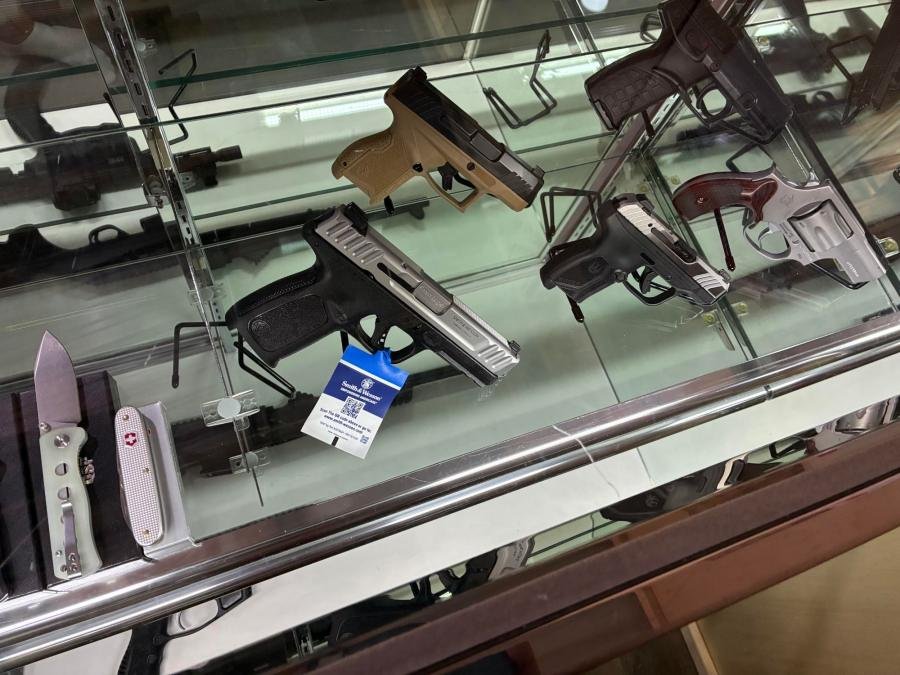 Handguns on display in the case